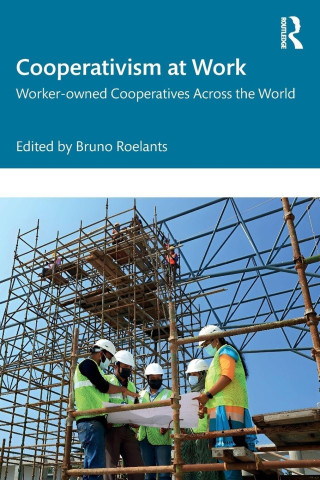 Cover of "Cooperativism at Work" by Bruno Roelants. Features construction workers in hard hats and vests reviewing plans, amidst scaffolding.