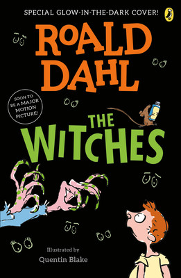 Roald Dahl’s The Witches cover: orange and green title on black, eerie eyes, reaching witch hands, and a startled child; spooky, playful mood.