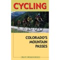 Cycling book cover titled "Cycling Colorado's Mountain Passes" by Kurt Magsamen. Shows cyclists climbing a scenic mountain road surrounded by trees.