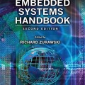 "Cover of 'Embedded Systems Handbook, Second Edition.' Features a digital globe, circuit patterns, and binary code, conveying a tech-focused theme."