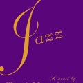Purple book cover with "Jazz" in large yellow cursive. Below, "A novel by Toni Morrison" and "Winner of the Nobel Prize" in yellow serif font.