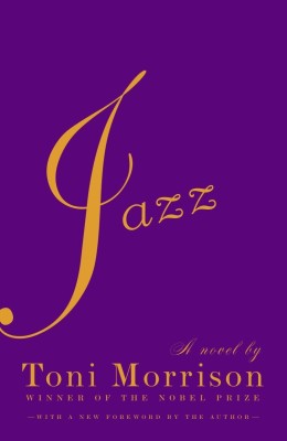 Purple book cover with "Jazz" in large yellow cursive. Below, "A novel by Toni Morrison" and "Winner of the Nobel Prize" in yellow serif font.